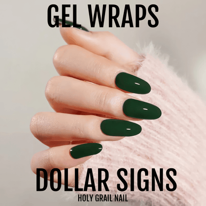 Deep forest green glossy gel nail wraps on hand displaying solid colour manicure