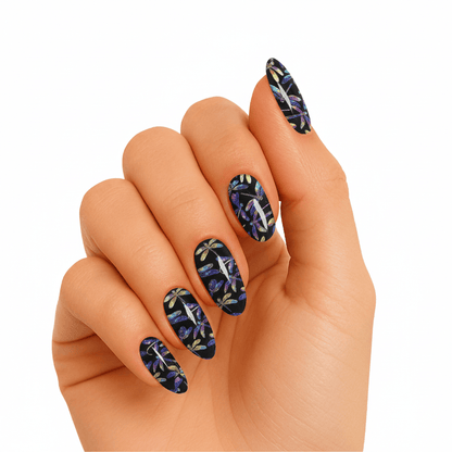 Purple holographic dragonfly gel nail wraps on hand with iridescent mystical design