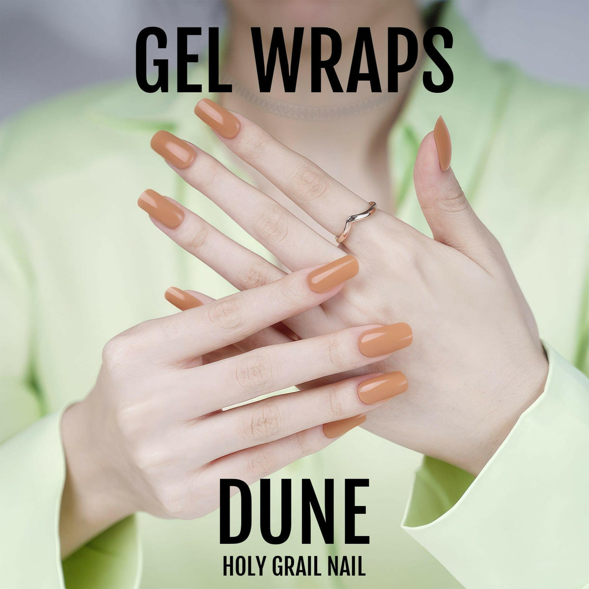 Caramel brown gel nail wraps displayed on crossed hands showing glossy autumn nail colour
