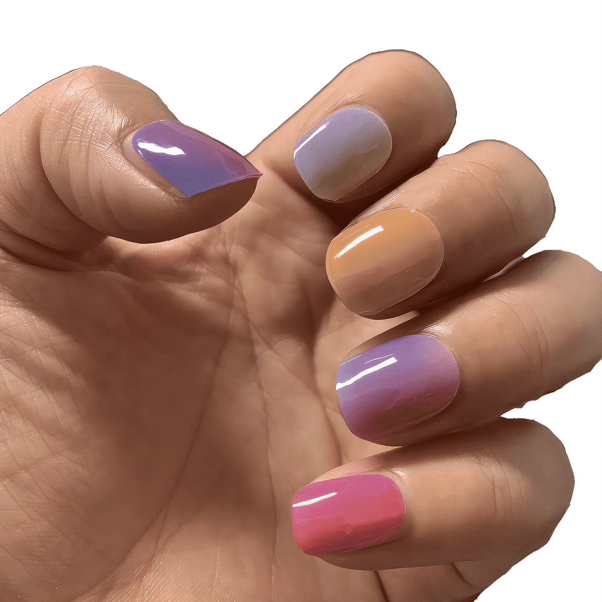 Hand displaying purple, pink, coral and peach gradient gel nail wraps manicure