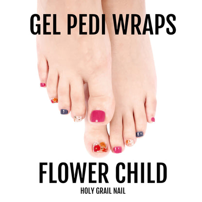 Colourful floral gel pedi wraps on toes featuring red, orange, navy and botanical designs