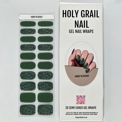 Green glitter gel nail wraps with shimmer finish in packaging for at-home manicure