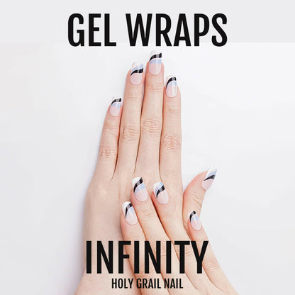 Modern abstract wave gel nail wraps on hand featuring black and blue geometric pattern