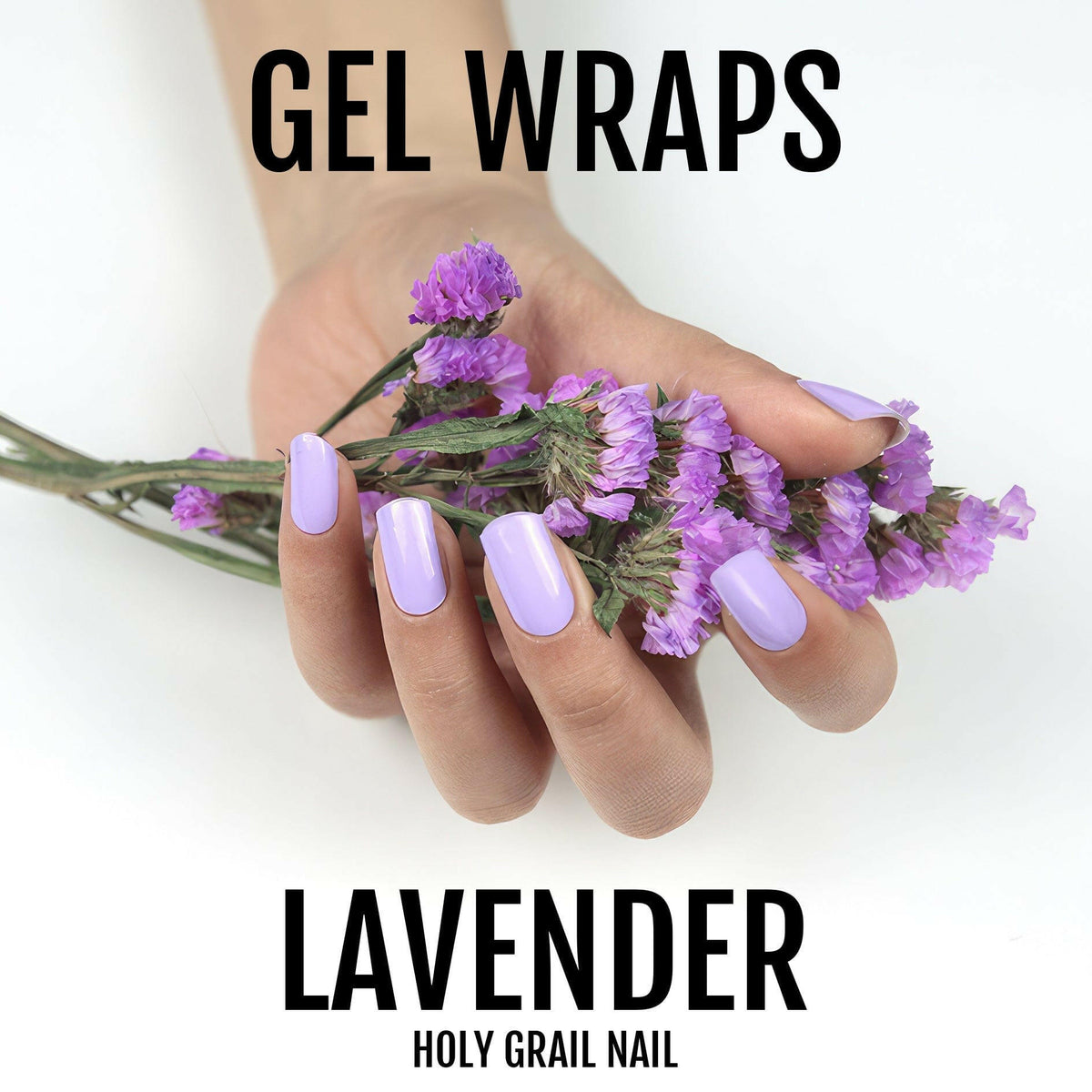 Hand holding purple flowers wearing lavender gel nail wraps for at-home manicure