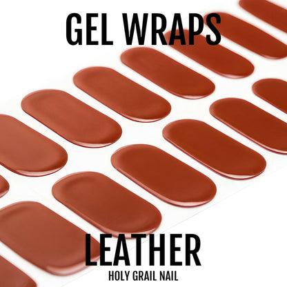 Close up of brown leather gel nail wraps showing glossy terracotta finish