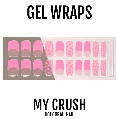 Pink gel nail wraps with hearts and polka dot patterns in various shades