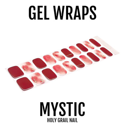 Red burgundy chrome gel nail wraps with gold chain detailing laid out on white background