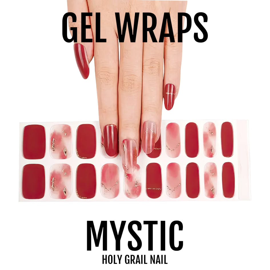 Hand with gel nail wrap sheet showing red burgundy chrome nails with gold chain patterns