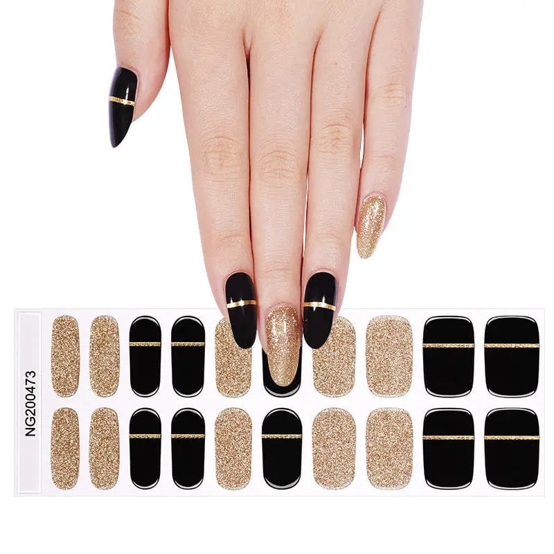 Semi-cured gel nail wrap sheet featuring black and gold glitter stripe design