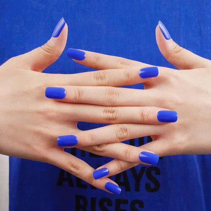 Sapphire blue gel nail wraps at-home manicure on both hands with glossy finish