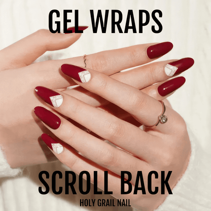 Burgundy gel nail wraps with white art deco scroll design for at-home manicure