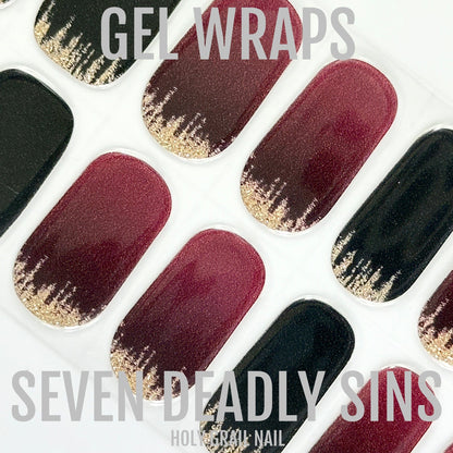 Burgundy and dark green gel nail wraps with gold glitter gradient tips