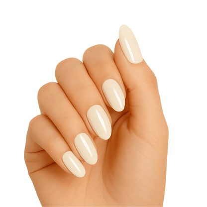 Cream nude gel nail wraps on hand showing glossy minimalist manicure finish