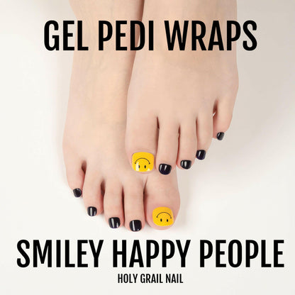 Gel pedicure wraps in black with yellow smiley faces for at-home pedicure