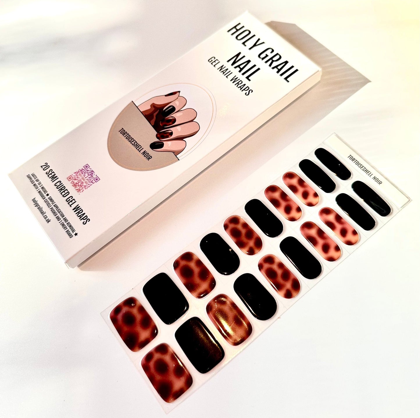 Tortoiseshell gel nail wraps packaging with black and amber animal print design