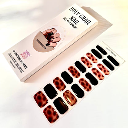 Tortoiseshell gel nail wraps packaging with black and amber animal print design