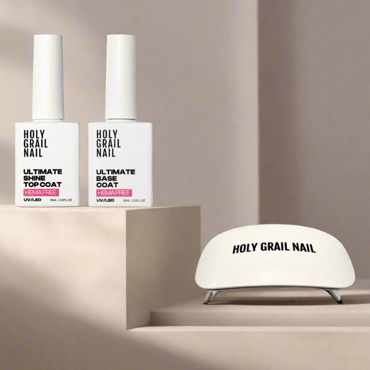 White UV lamp with base coat and top coat bottles for gel nail wraps curing