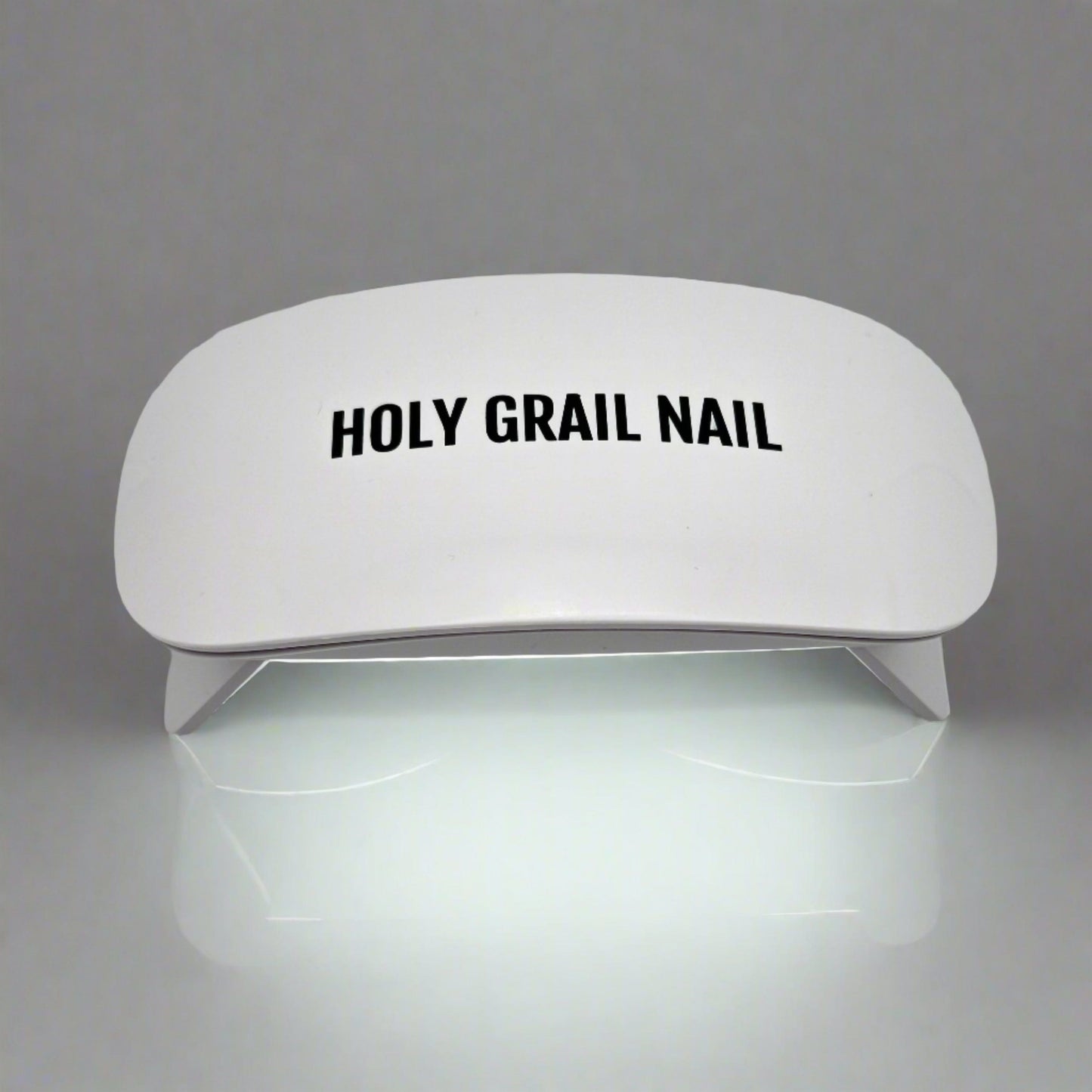 White UV LED nail lamp for curing gel nail wraps and polish at home