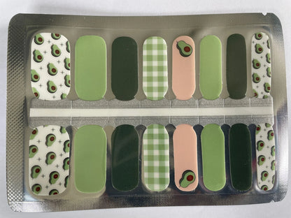 Green and peach nail wraps with avocado print, gingham, and solid colour accents