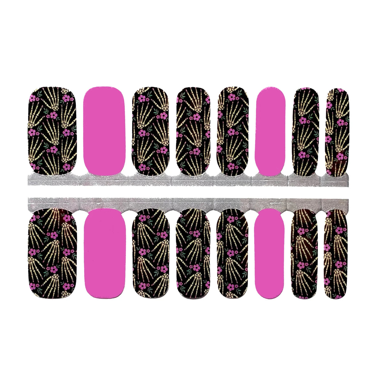 Black nail wraps with pink floral skeleton hands print, paired with solid pink accent nails