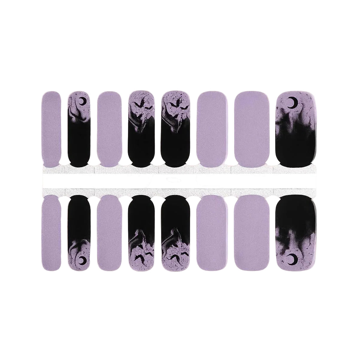 Lilac nail wraps with black smoke, crescent moons, and bat silhouette accents